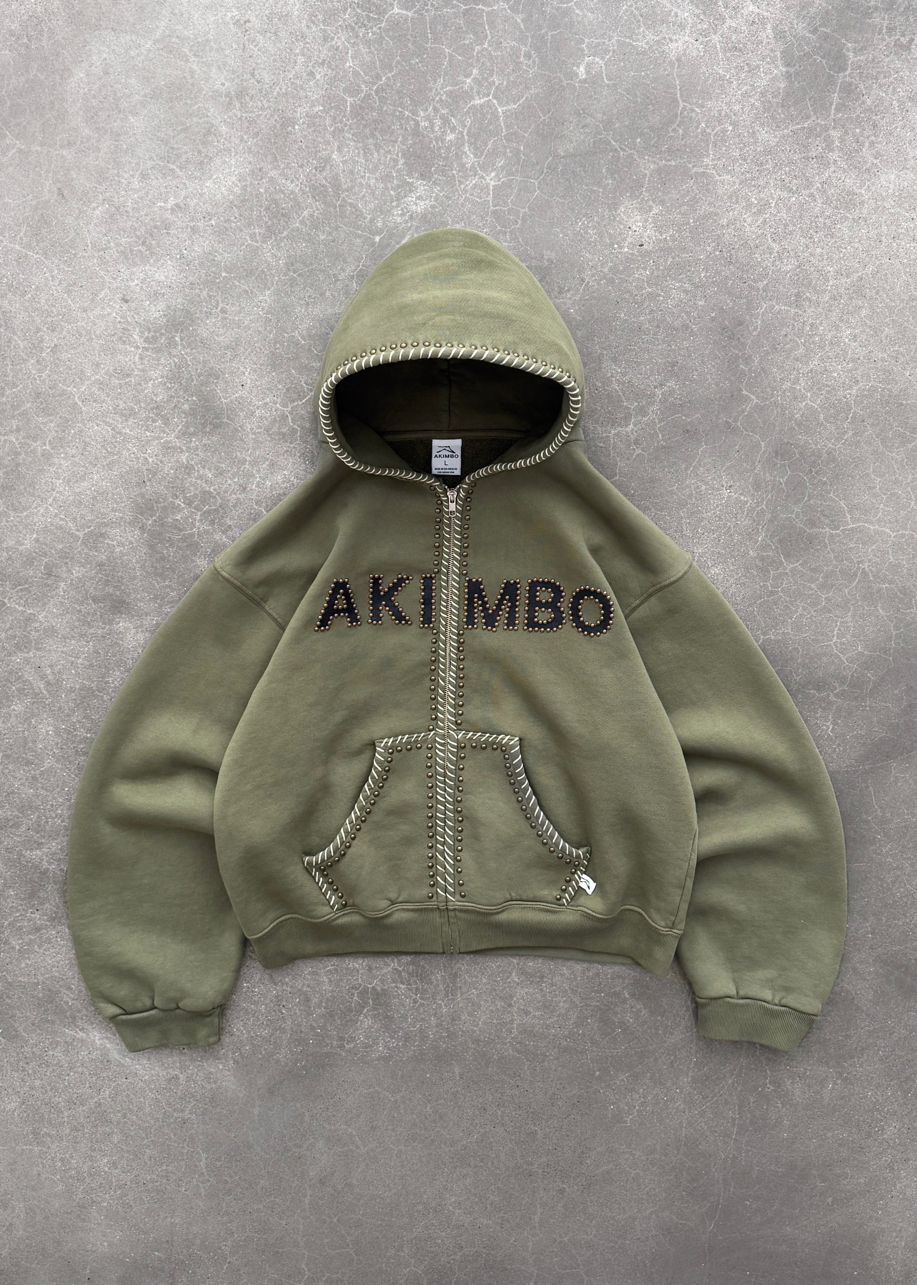 STUDDED TRAINING ZIP-UP HOODIE - OD GREEN