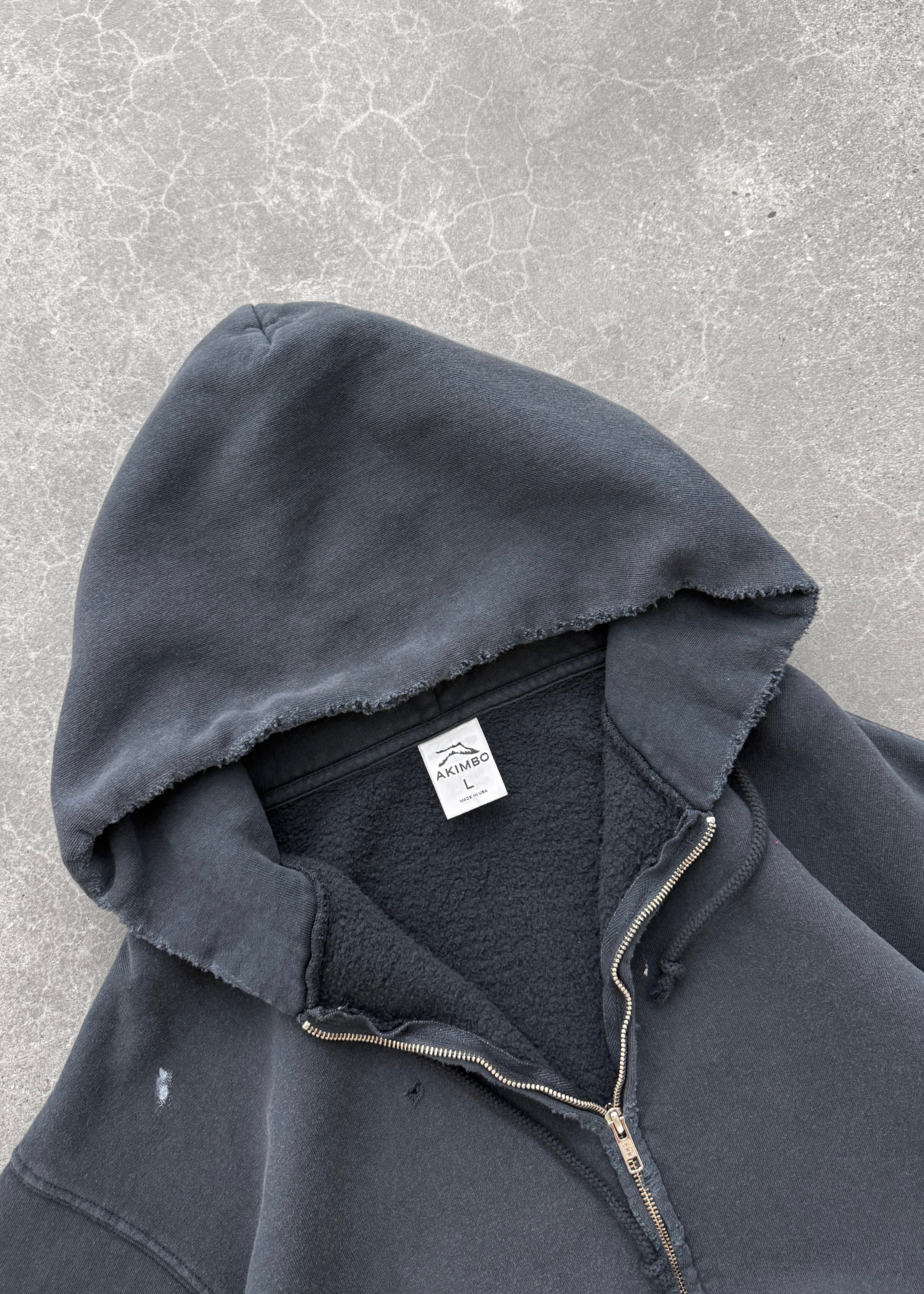 "WATCH PEEKER" ZIP-UP HOODIE - FADED BLACK