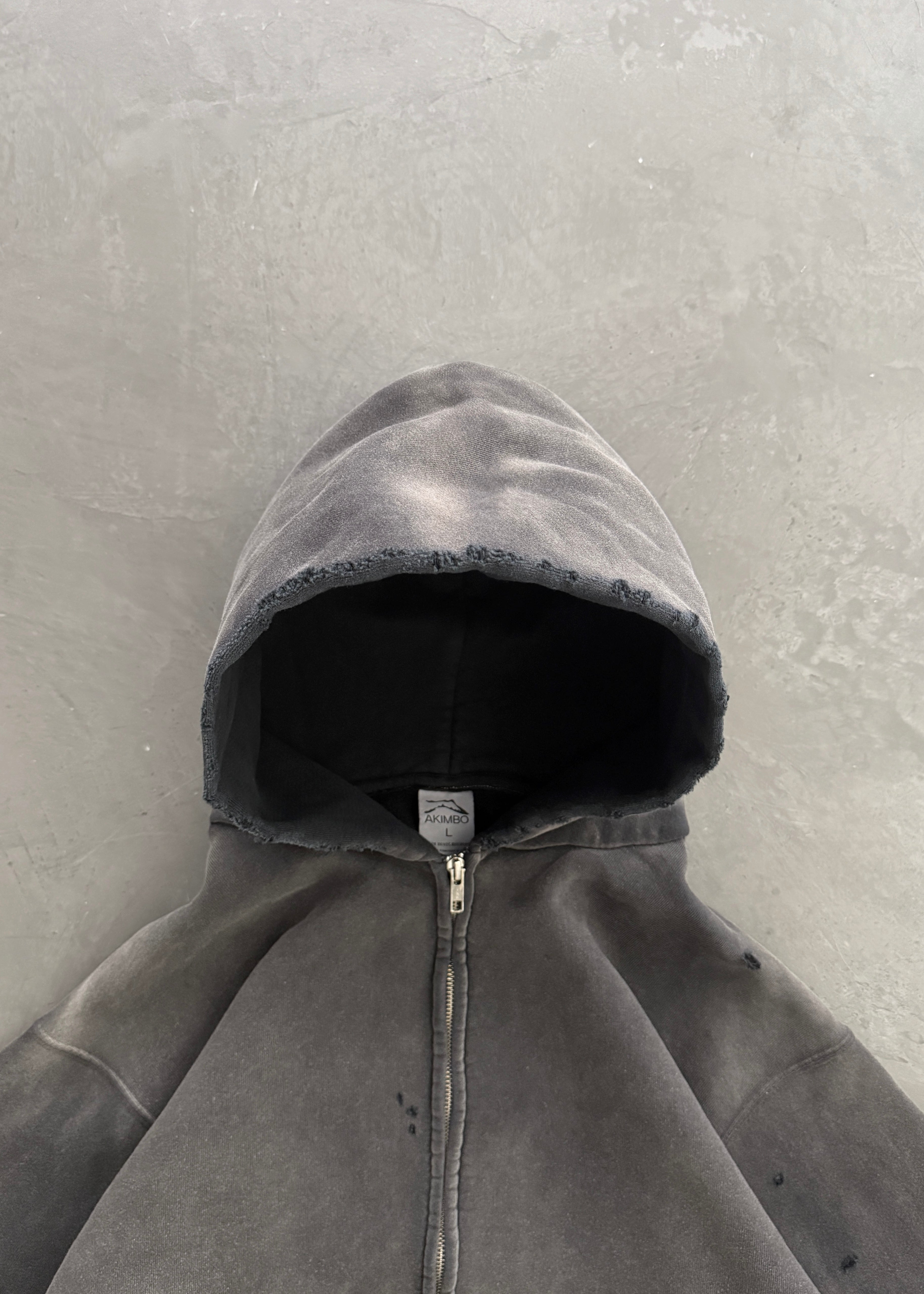 AKIMBO "WATCH-PEEKER" DISTRESSED ZIP UP HOODIE - SUN FADED BLACK