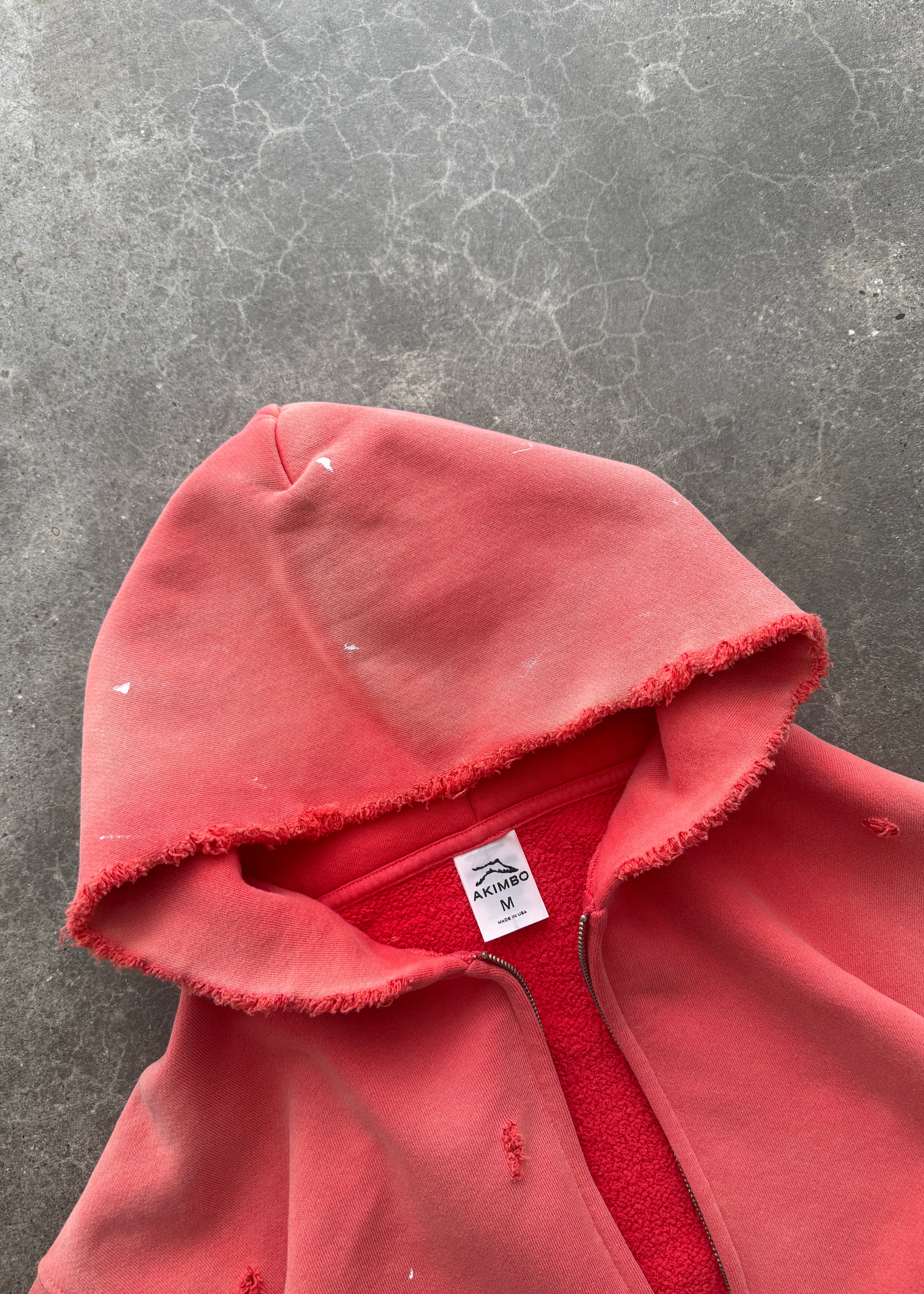 "WATCH-PEEKER" ZIP UP HOODIE - SUN FADED RED