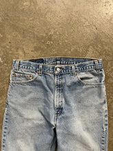 Load image into Gallery viewer, LEVI&#39;S 501 LIGHT WASH DISTRESSED JEANS - 1990S
