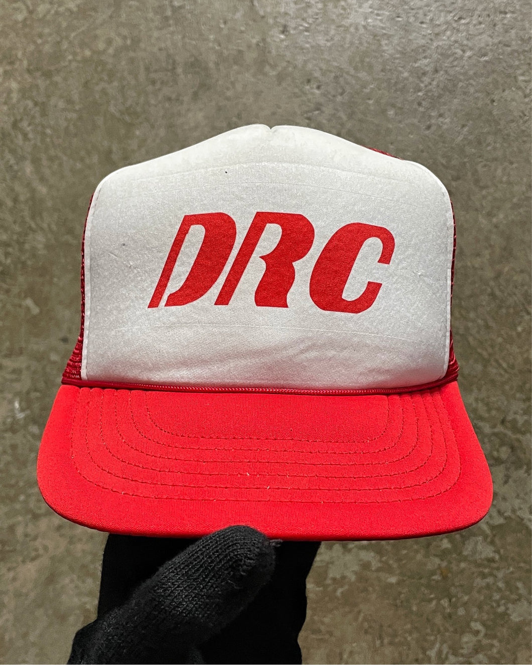 RED & WHITE “DRC” TRUCKER HAT - 1990S