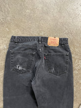 Load image into Gallery viewer, LEVI’S 505 FADED BLACK RELEASED HEM JEANS - 1990s
