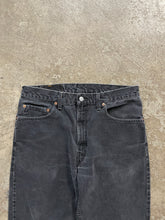 Load image into Gallery viewer, LEVI’S 505 FADED BLACK RELEASED HEM JEANS - 1990s
