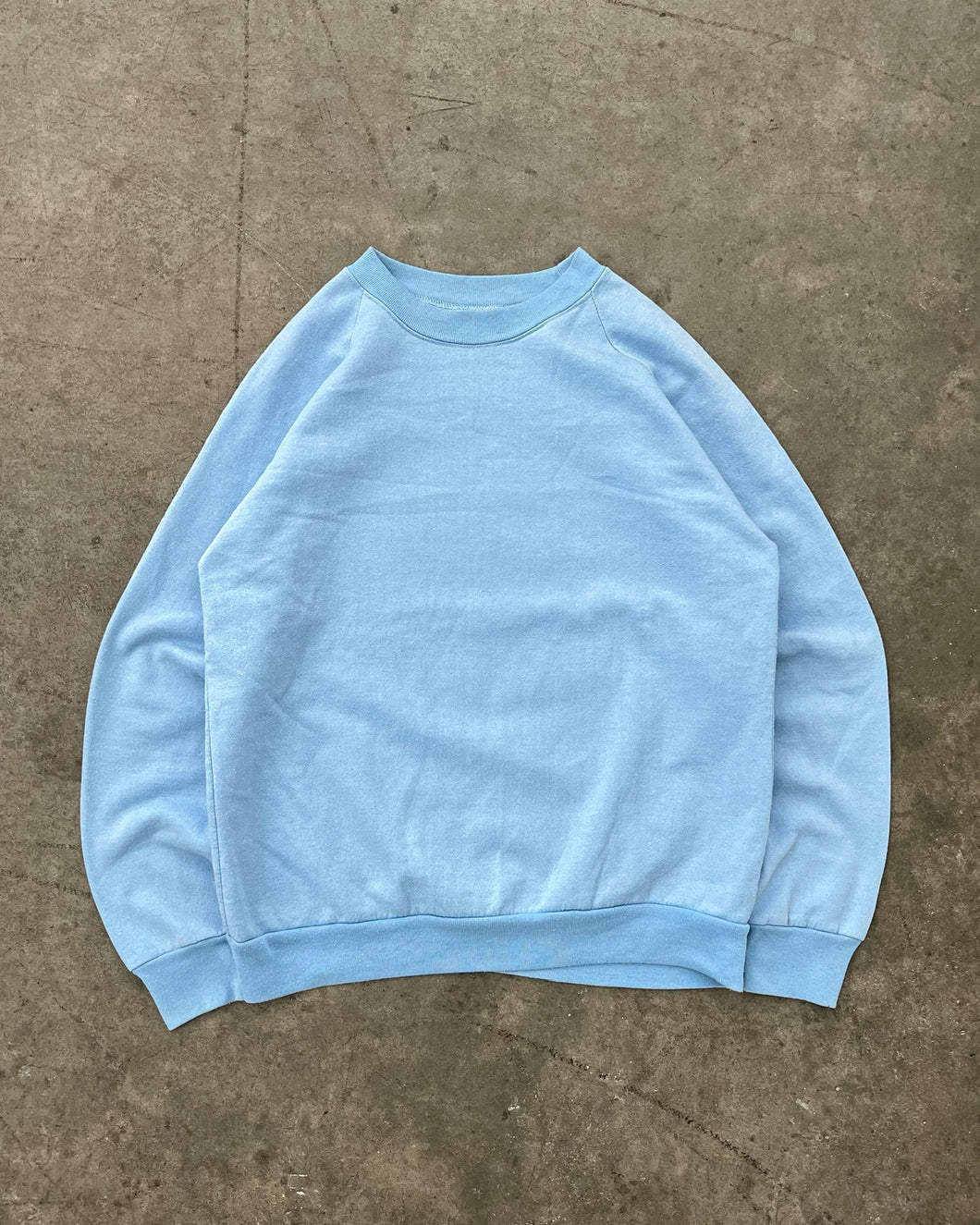 FADED SKY BLUE RAGLAN SWEATSHIRT - 1990S